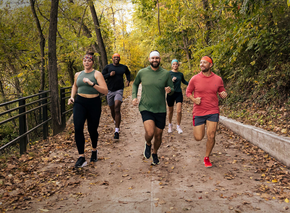 5 runners on a trail, all wearing different JUNK headbands.